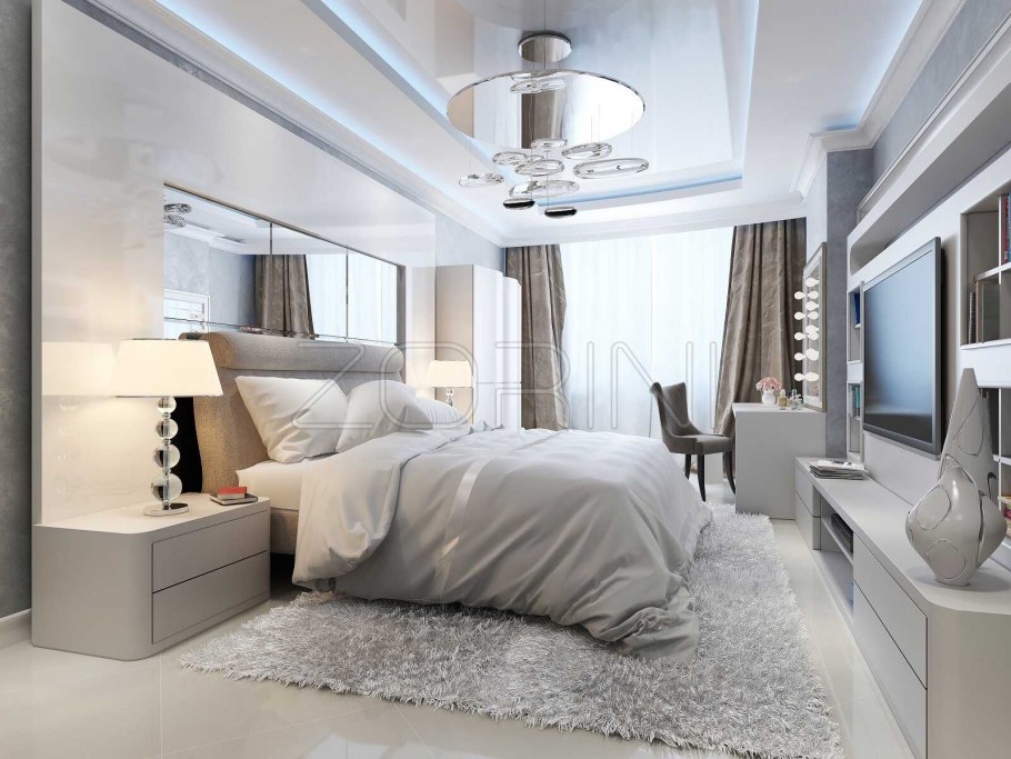 Уютная спальня с большой кроватью