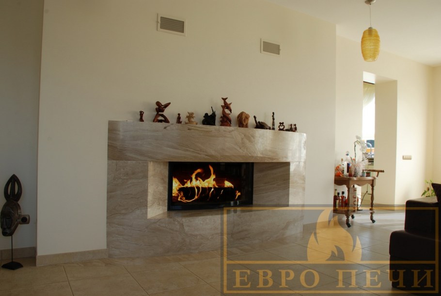 Современный камин из мрамора
