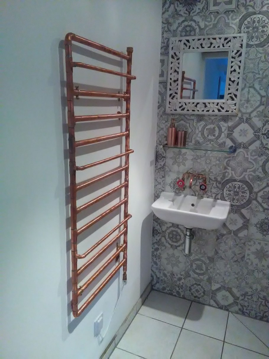 Полотенцесушитель в ванную