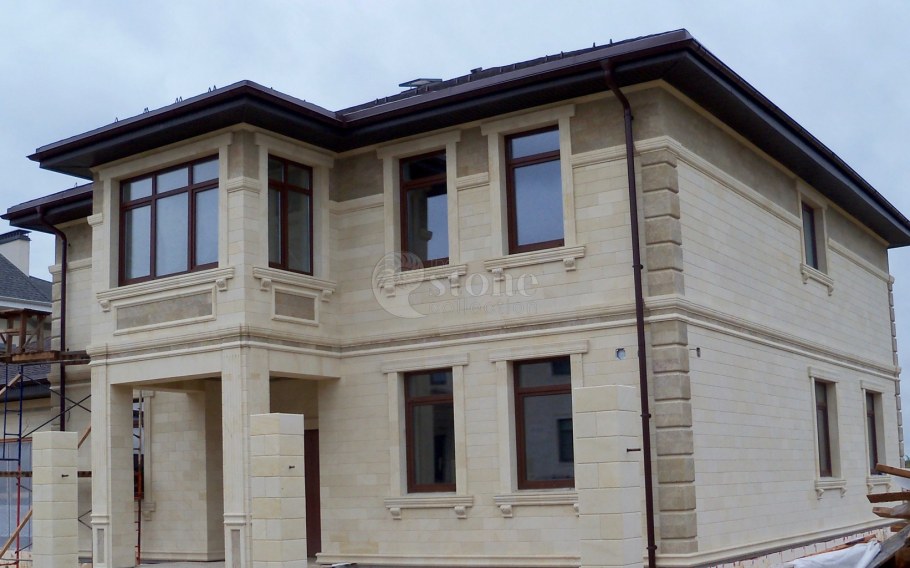 Фасад дома под мрамор