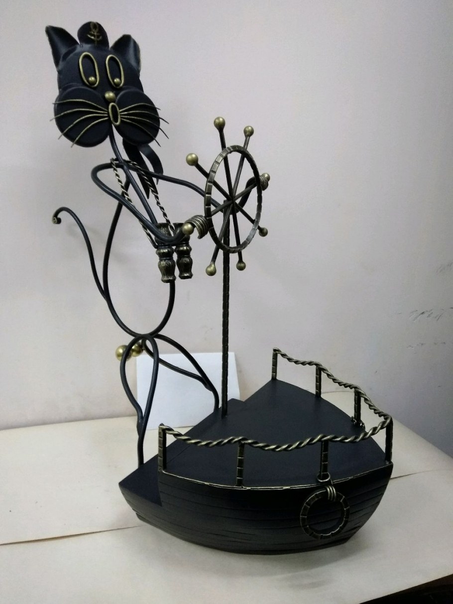 Кованые цветочницы кот