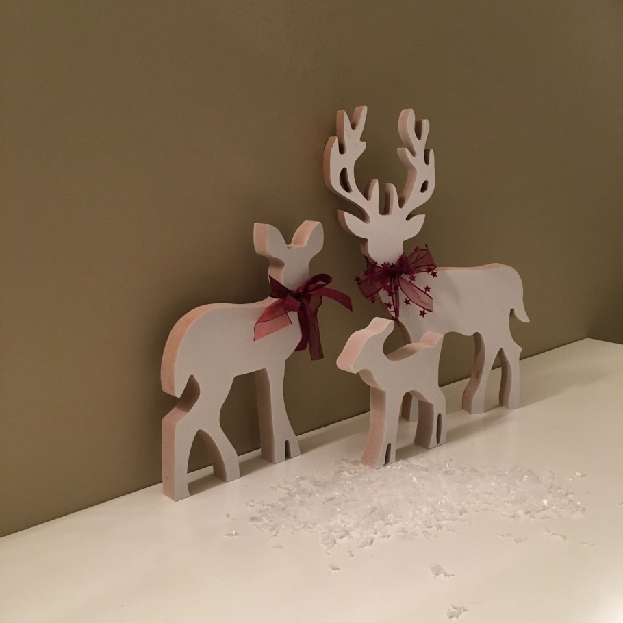 Голова оленя из дерева