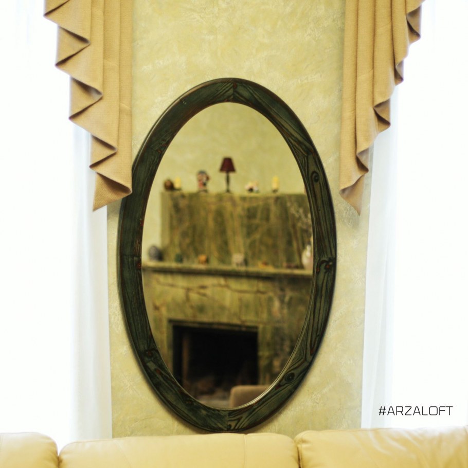 Зеркало в металлической раме