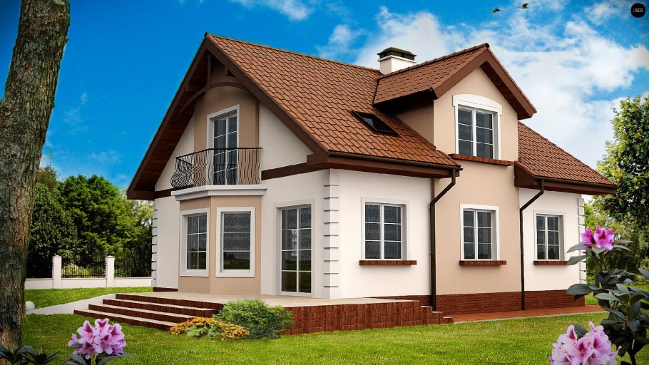 Красивый фасад дома с мансардой