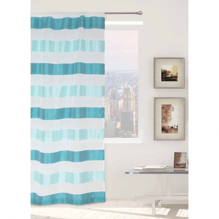 Бирюзовые шторы в спальне