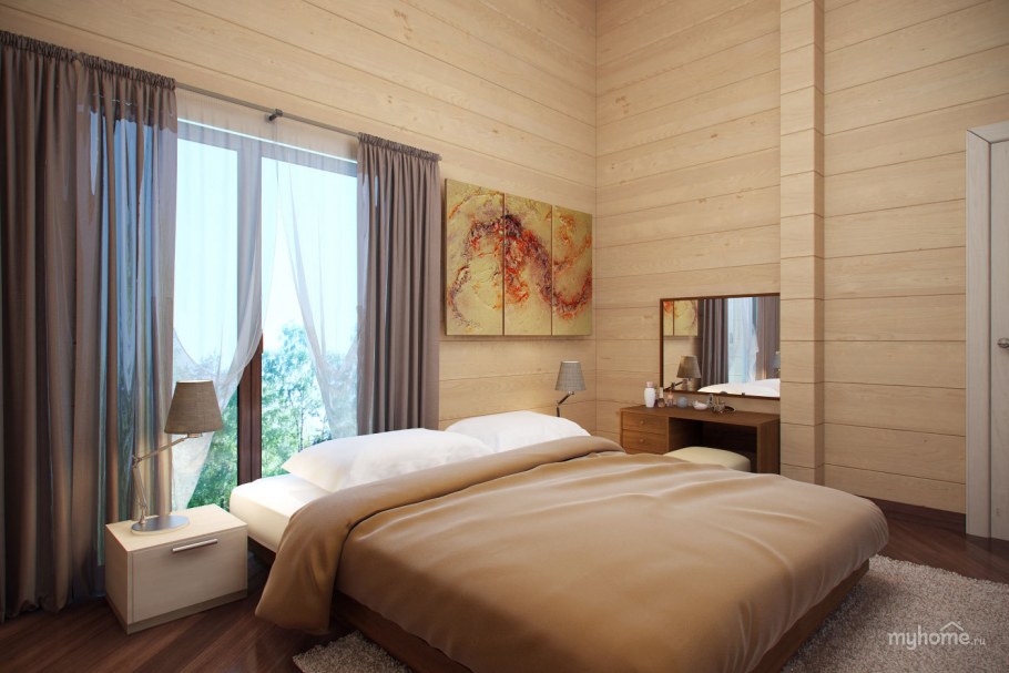 Большая спальня в коттедже