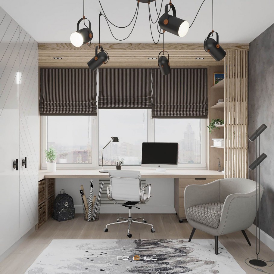 Рабочее место у окна в комнате