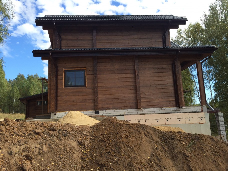 Варианты покраски фасада из сруба