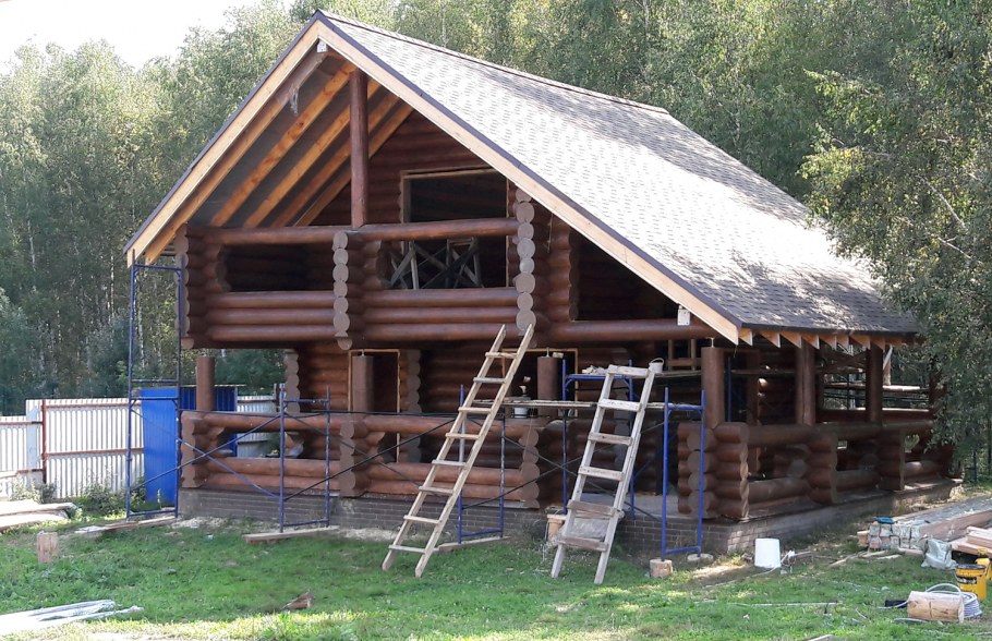 Заводское окрашивание деревянного дом