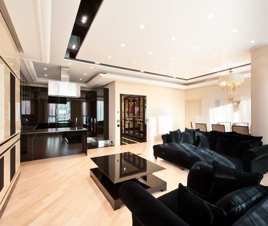 Интерьер кухни-гостиной с темным полом