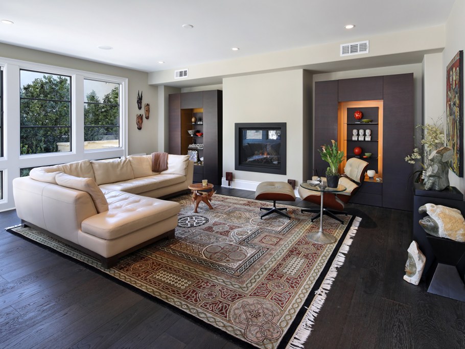 Ковры в интерьере гостиной современный стиль