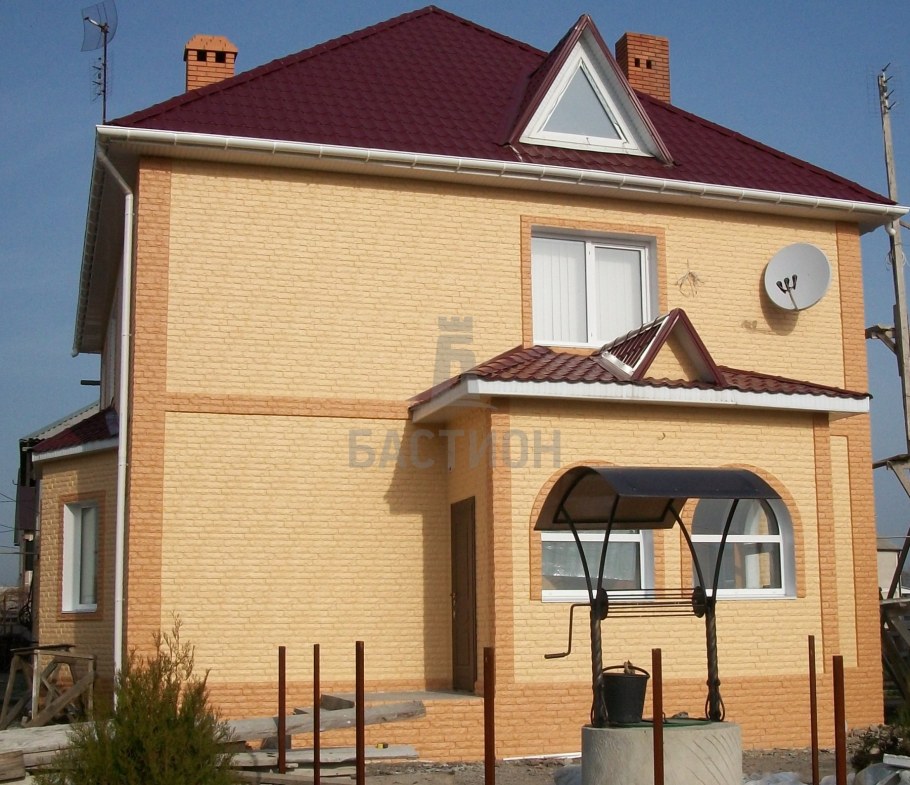 Покраска фасада кирпичного дома