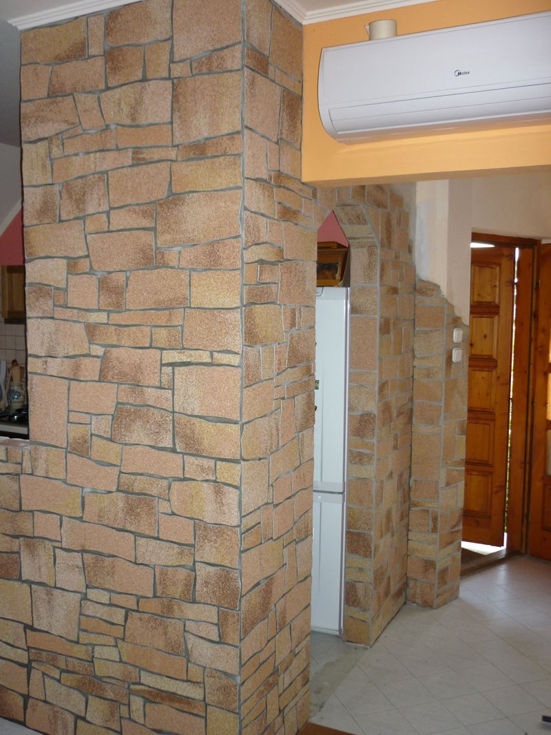 Панели под камень в интерьере