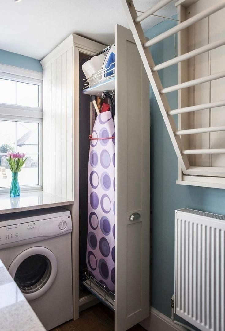 Гладильная доска в интерьере прачечной