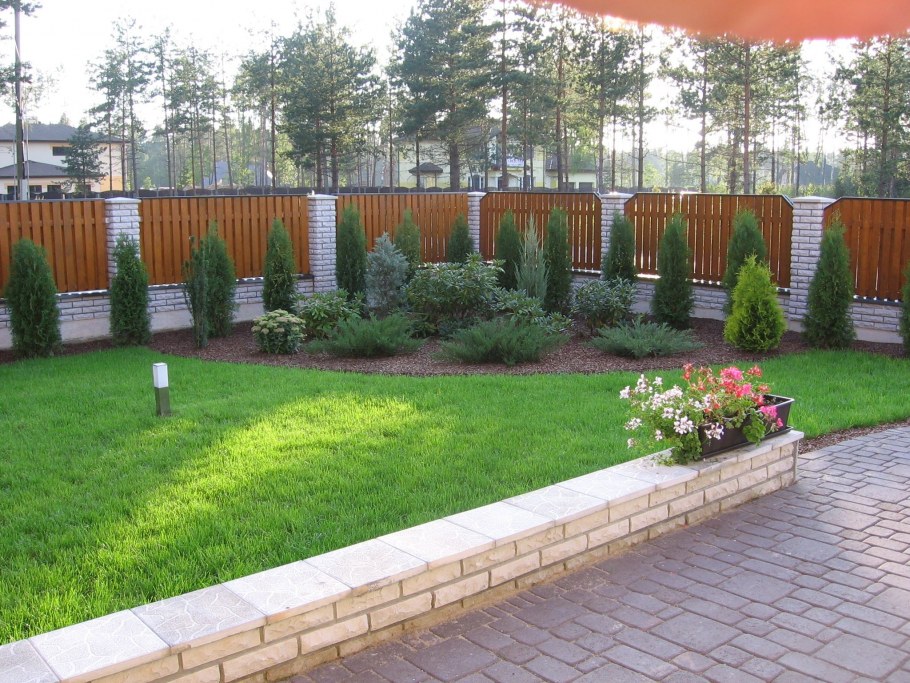 Ограждение для клумбы из камня