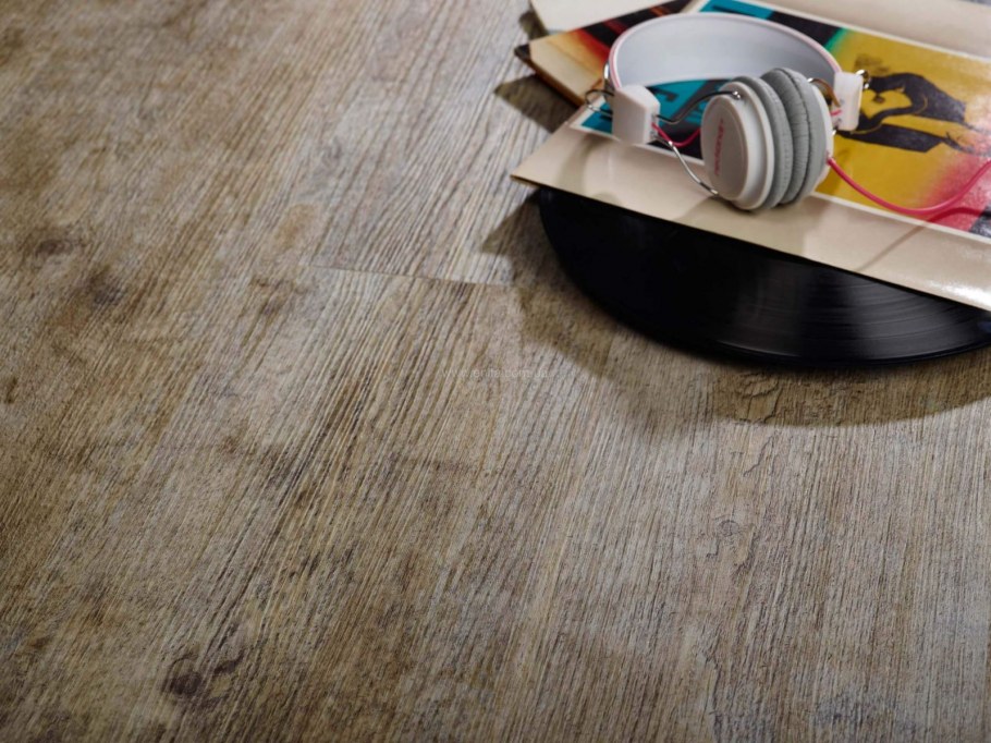 Стык плитки и ламината пробковый компенсатор