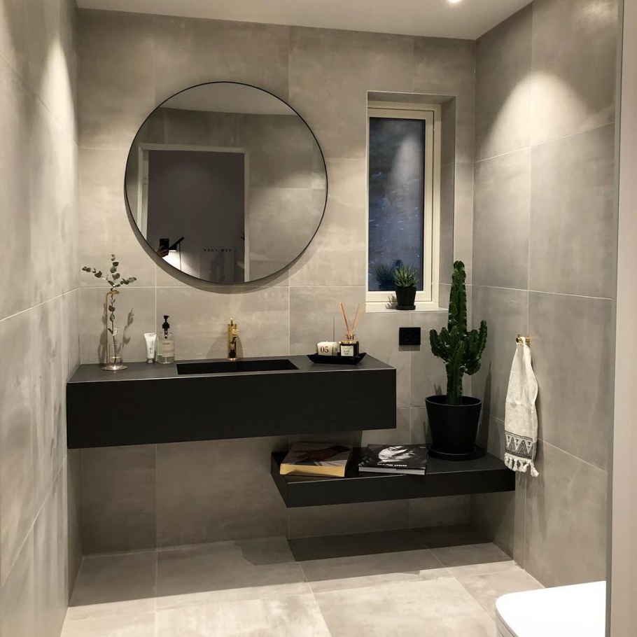 Круглое зеркало в ванной в интерьере