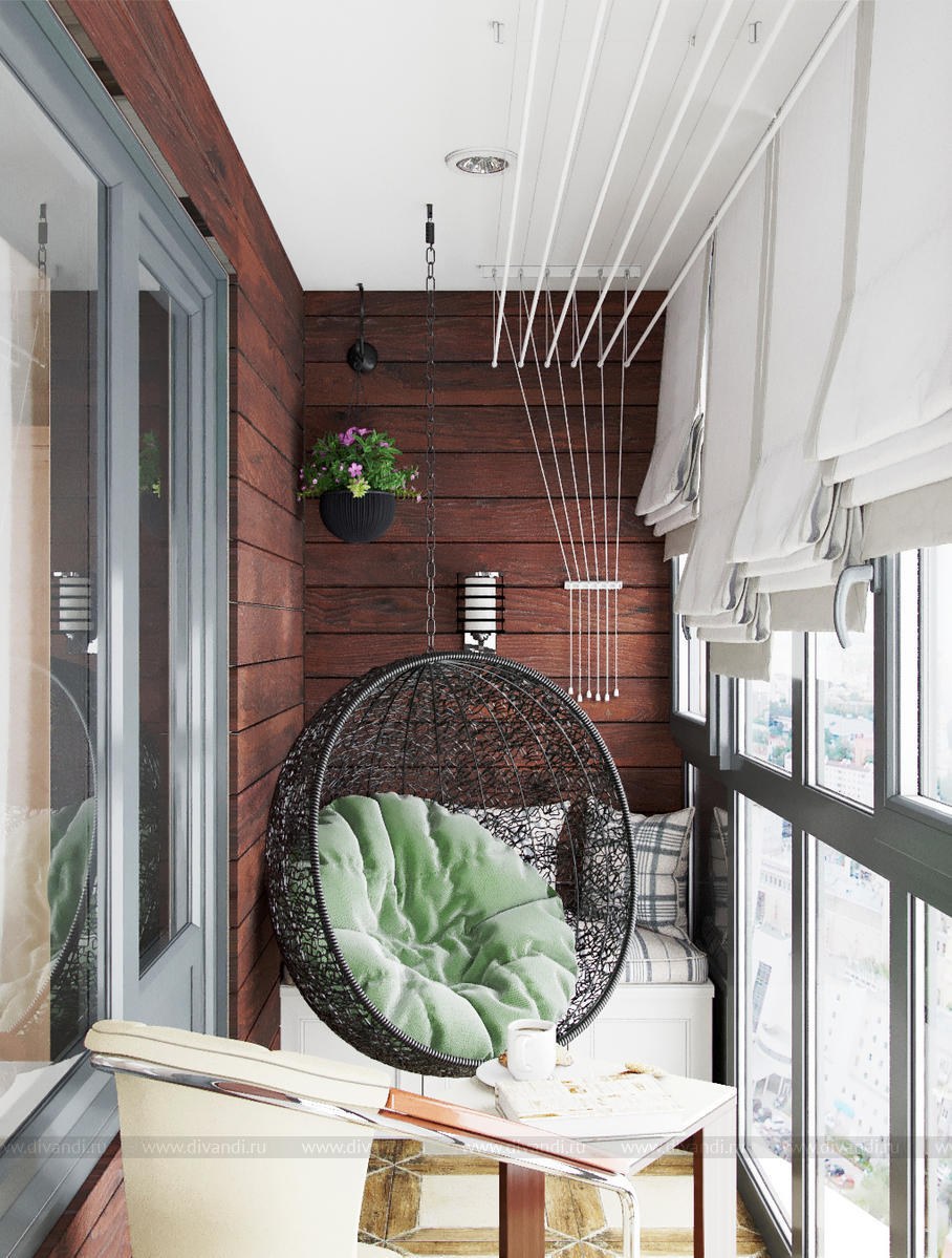 Подвисноеикресло на балконе