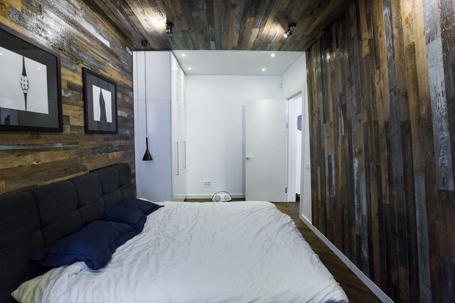 Ламинат на стене в спальне