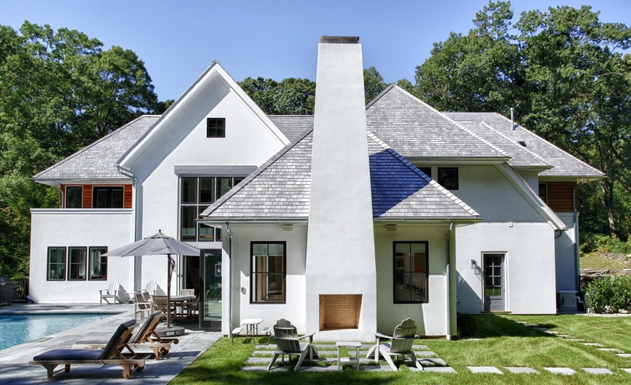 Дом обшитый Альта профиль кирпич