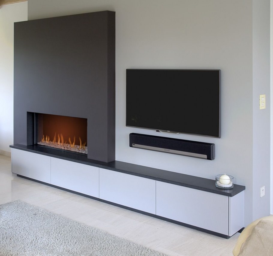 Камин под телевизором современный