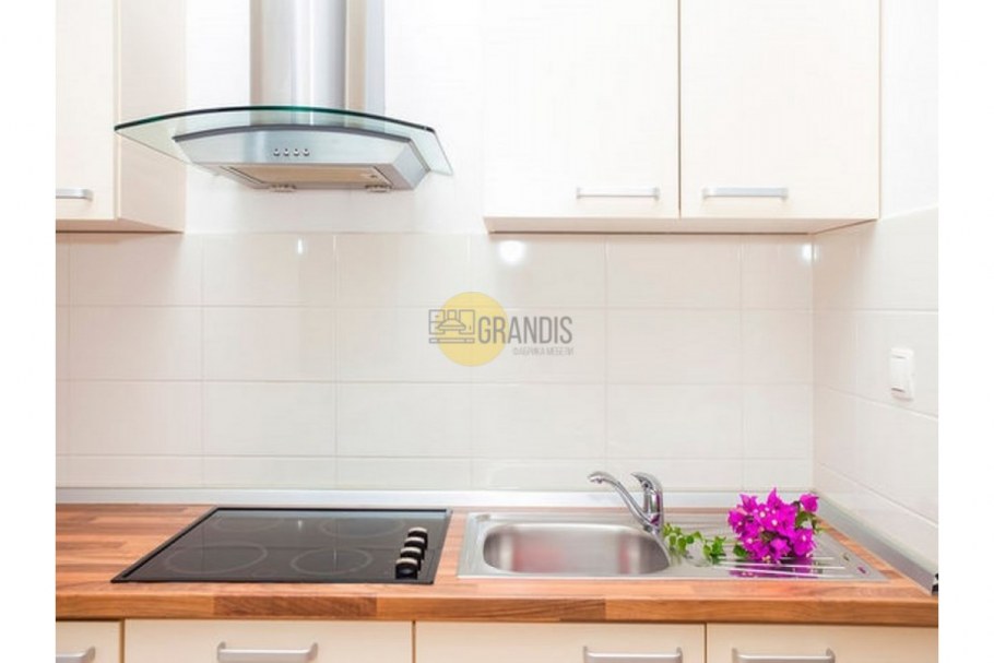 Наклонные вытяжки в интерьере кухни