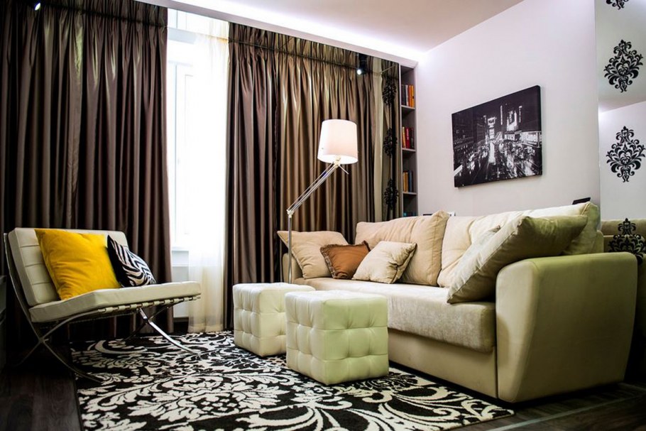 Гостиная с изумрудным диваном