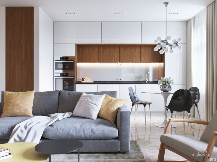 Современная белая гостиная с кухней