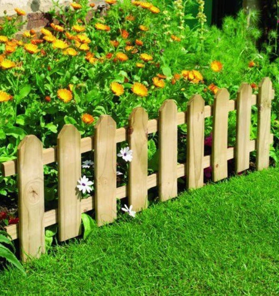Ограждения для клумб из бревен