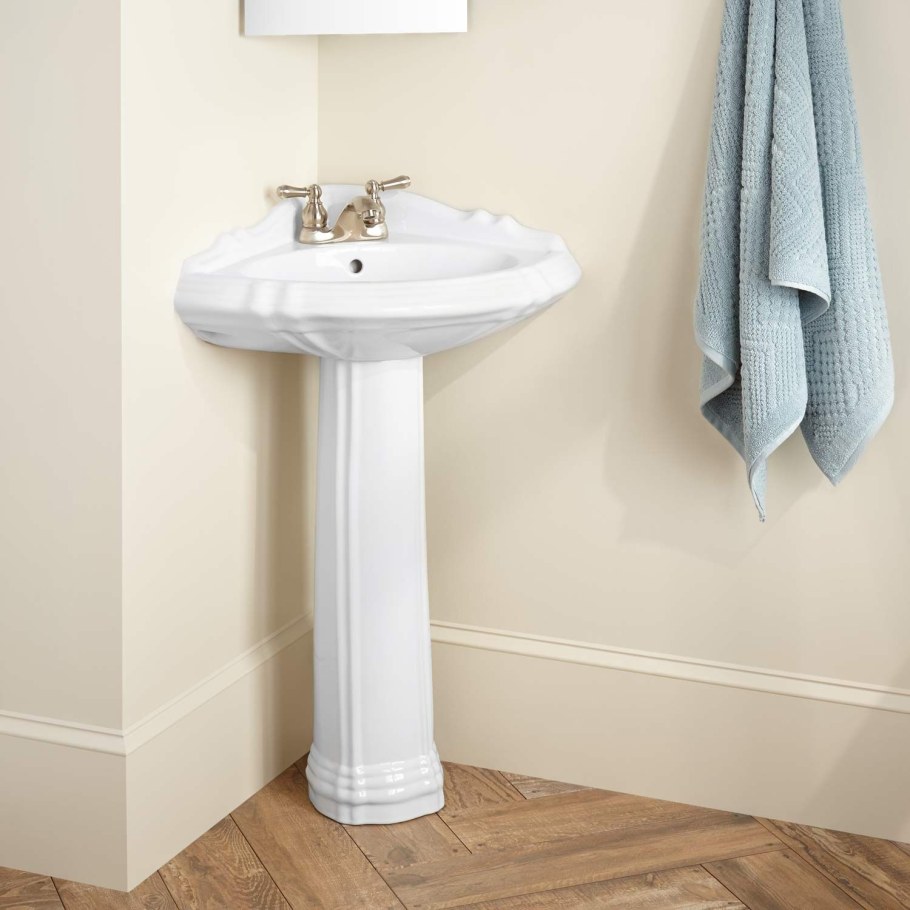 Угловая раковина в ванную с пьедесталом